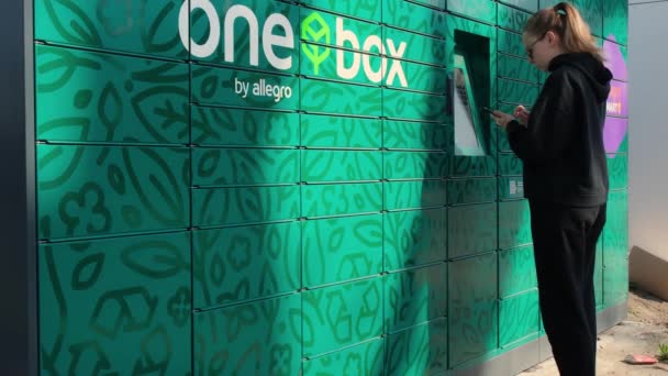 Gdansk Poland May 2022 Woman Collecting Parcel Shopping Locker Allegro — Vídeos de Stock