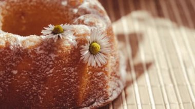 4k zoom in out Cupcake decorated chamomile flower In the rustic style. Authentic photo. Easter concept greeting card background. Sun rays Homemade baked concept. Summer, Spring time recipe. Mothers