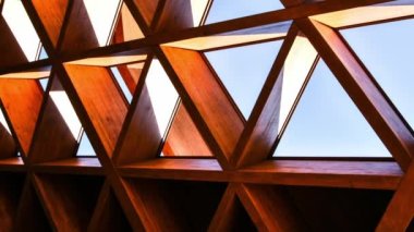4k zoom in out Roofing Construction. Wooden Roof Frame House Construction. Abstract Structure background. Wood texture pattern. Architecture minimal concept. Visual art. Conceptual