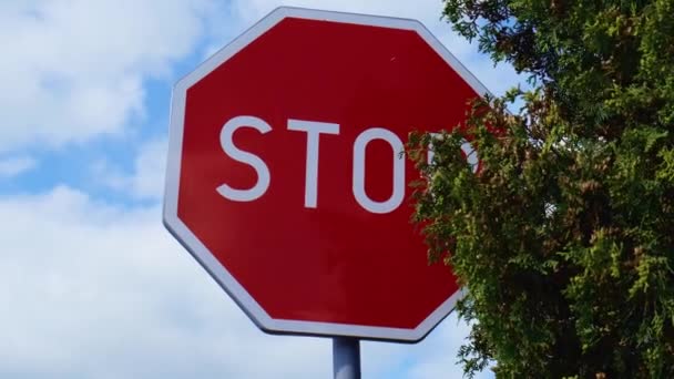 Red Stop Sign Metal Pole Street Road Attention Sign Cloudy — Stock video