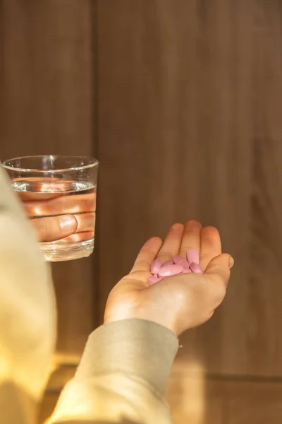 Female Hand Holding Glass Water Pink Pill Collagen Supplement Nutrition — Zdjęcie stockowe