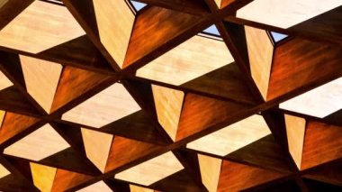 4k zoom in out Roofing Construction. Wooden Roof Frame House Construction. Abstract Structure background. Wood texture pattern. Architecture minimal concept. Visual art. Conceptual