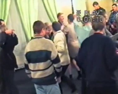 Zhytomyr, Ukraine - September 1997. Nostalgia old footage people dance and drink on birthday party. Friends and family enjoy celebrating. Family reunion. Retro vintage 90s happy people life