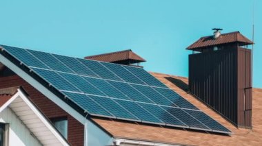 4k zoom in out New ecologic house with solar panels Alternative to conventional energy. The battery is charged from a solar cell Advertisement Green energy Sustainable life Renewable