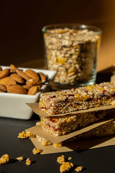 Homemade natural Granola energy bar. Variety of homemade Protein granola breakfast bars ingredients nuts, raisins dried cherries and chocolate. Healthy nutrition eating. Gluten free cereal dieting