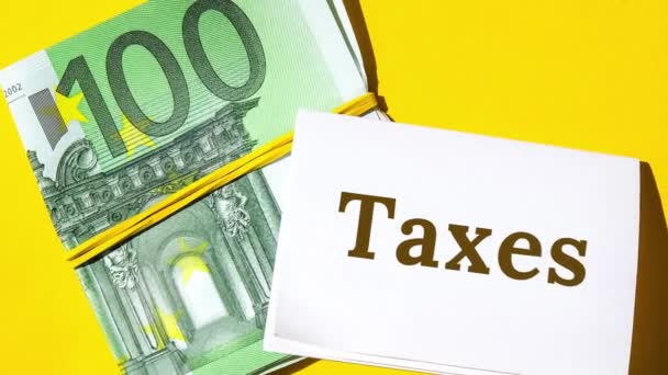 Zoom Out Paper Note Written Word Taxes Black Letters Euros — Stok video