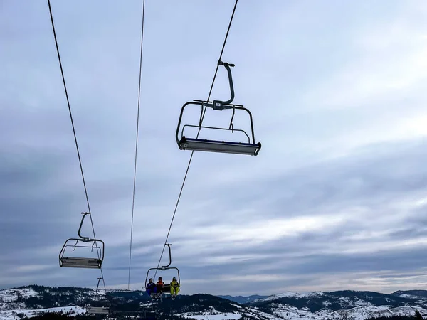 Bukovel Ukraine February 2022 People Going Ski Lift Snowy Mountain — стокове фото