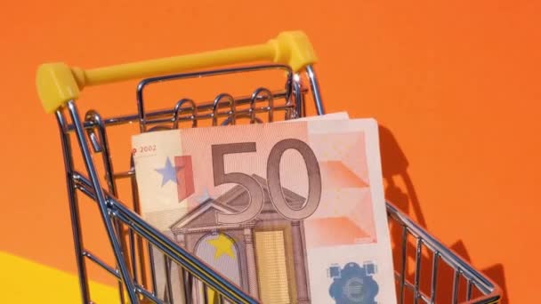 Euro Banknote Money Toy Supermarket Trolley Shopping Cart Yellow Background — Stock Video