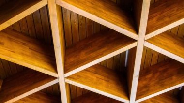 4k zoom in out Roofing Construction. Wooden Roof Frame House Construction. Abstract Structure background. Wood texture pattern. Architecture minimal concept. Visual art. Conceptual