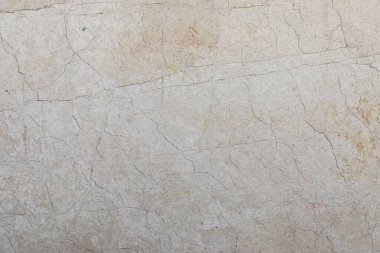 Krem rengi mermer taşın arkaplan ve dokusu damarlarla