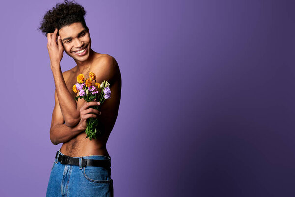 Portrait of smiling transgender male with flowers. Sensitive athletic sportsman with perfect body — Stock Photo, Image