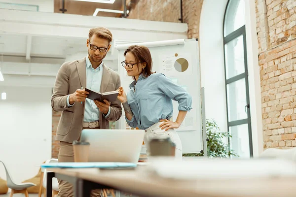 Team male leader is examining teamwork results — Foto de Stock