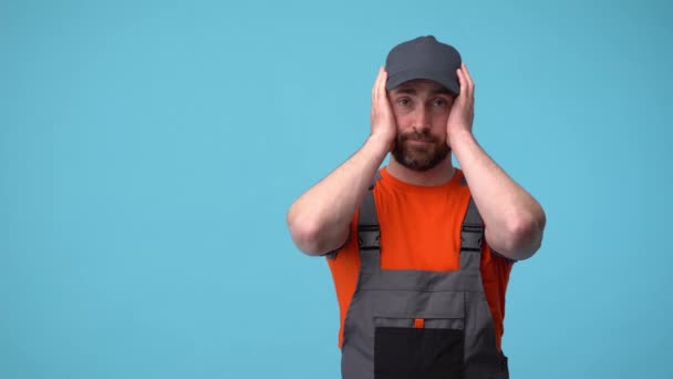 The worker in uniform is shocked by the problems and does not know how to solve them Video Stock