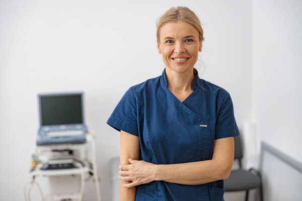 Portrait Smiling Doctor Ultrasound Specialist Looking Camera Her Workplace Clinic Stock Photo
