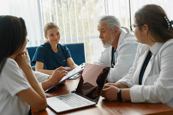 Successful Medical Doctors Discussing Diagnosis Conference High Quality Photo Stock Image