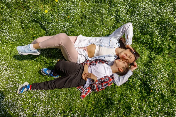 Top View Young Beautiful Woman Lying Green Grass Small Son — Foto de Stock