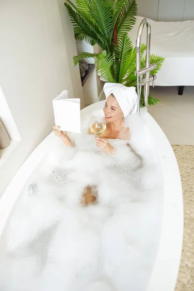 Attractive Caucasian Young Woman Towel Head Taking Bath Reading Book — Fotografia de Stock