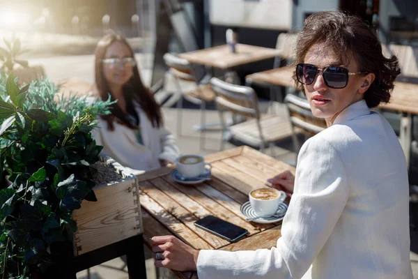Attractive Business Woman Sunglasses Drinking Coffee Sitting Cafe Looking Away — Stok fotoğraf