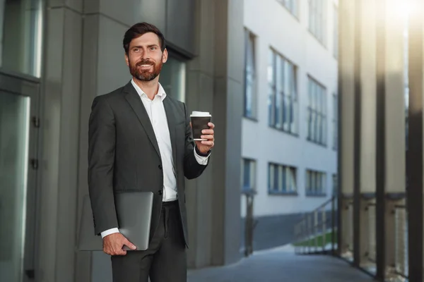Confident Businessman Suit Laptop Coffee Office Building Blurred Background — Foto de Stock