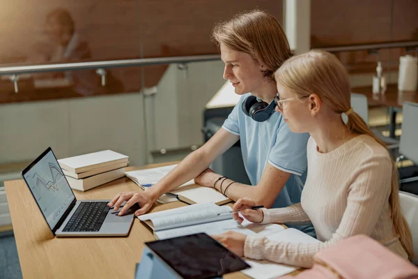 Two Friends Students Laptop Books Studying University Library Blurred Background — Foto Stock