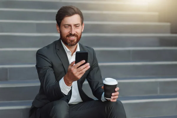 Businessman Suit Sitting Stairs Coffee Break Using Phone Blurred Background — ストック写真