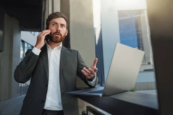 Focused Businessman Suit Laptop Talking Phone Office Building Business Concept — Foto de Stock