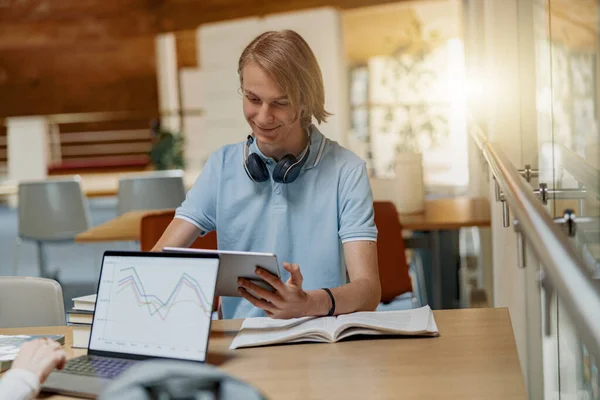 Young Talented Male Student Studying Digital Tablet Sit University Library — Foto Stock