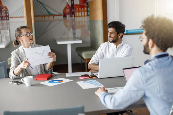 Diverse Coworkers Analyzing Sales Report While Working Together Office Blurred — Photo