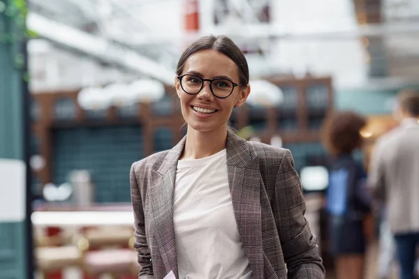 Smiling Businesswoman Standing Modern Office Colleagues Background Looking Camera — Stok Foto