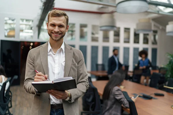 Smiling Handsome Businessman Standing Office Looking Camera High Quality Photo — Foto Stock