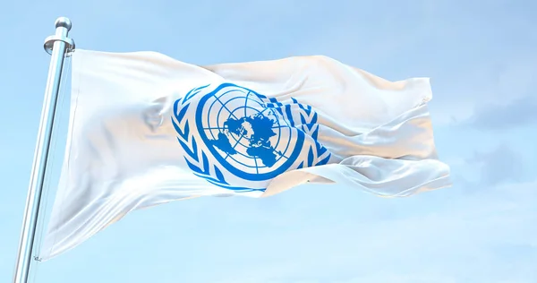 Yhdistyneiden Kansakuntien Lippu Heiluttaa — kuvapankkivalokuva