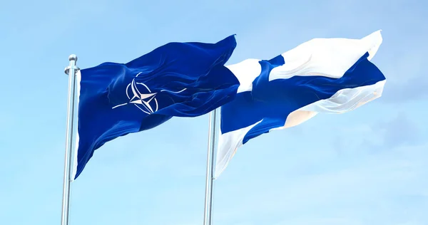 Nato Mot Finland Flaggvifting – stockfoto
