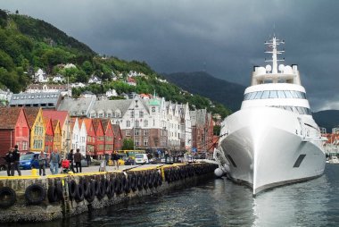 Bergen, Norway - June 19, 2009: Luxury Yacht A from Russian billionaire Andrei Igorevich Melnichenko on pier of Unesco World heritage site of Bryggen in Vagen harbor