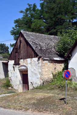 Austria, barn and old wine cellar built into the mountainside in the small town of Gallbrunn in eastern Lower Austria