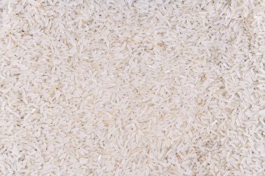 Beyaz uzun pirinç arka plan, pişmemiş işlenmemiş tahıllar, makro bakış