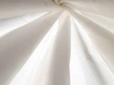 Beyaz katlanmış duş perdesinin arkaplanı