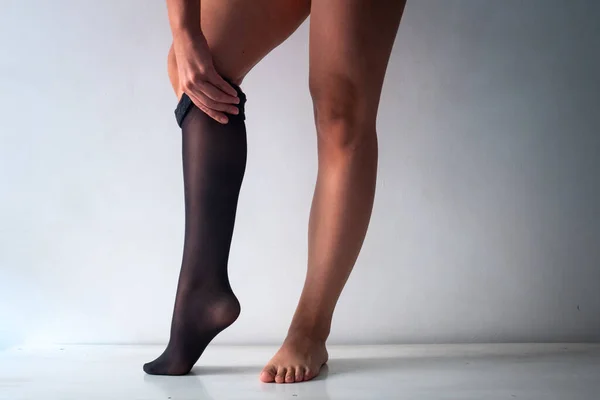 Brunette Woman Short Legs Wears Black Stocking White Background — Stock Photo, Image