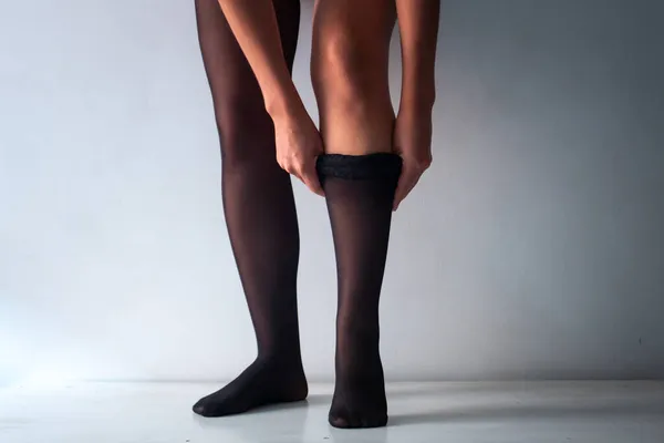 Brunette Woman Short Legs Wears Black Stockings White Background — Stock Photo, Image
