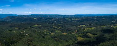 Mountains, Hills, Trees, Farms and Houses in the Countryside near Medellin, Antioquia, Colombia