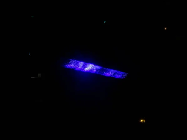 Siyah Arkaplanda Renkli Işıklar Projeksiyonu — Stok fotoğraf
