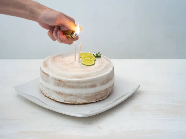Man Hand Lights Candles Vegan Birthday Cake Almond Coconut Lemon — Fotografia de Stock