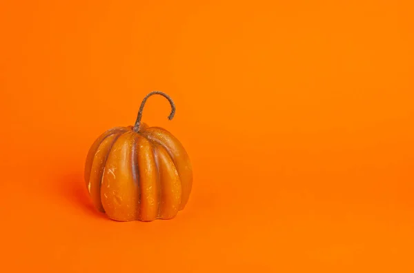 Miniature Pumpkin Candle Orange Background Copy Space Halloween Thanksgiving Harvest — Stock Photo, Image