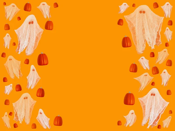 flying pumpkins and cute ghosts on a orange background with copy space. halloween and harvest festival
