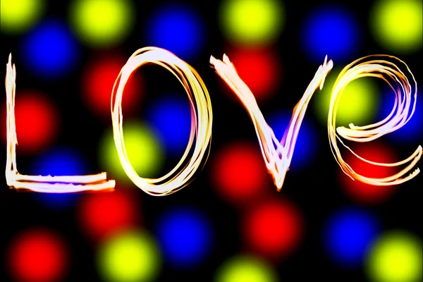 Word Love on color background — Stock Photo, Image