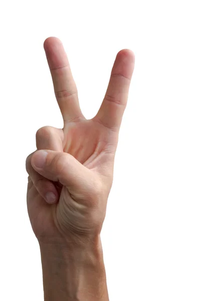 Рука показывает знак победы и мира крупным планом изолированы на ж Лицензионные Стоковые Фото