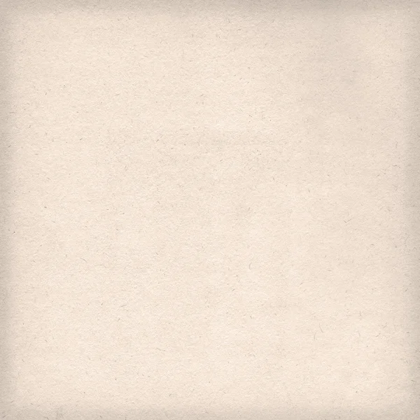 Текстура или фон из бежевой бумаги . — стоковое фото