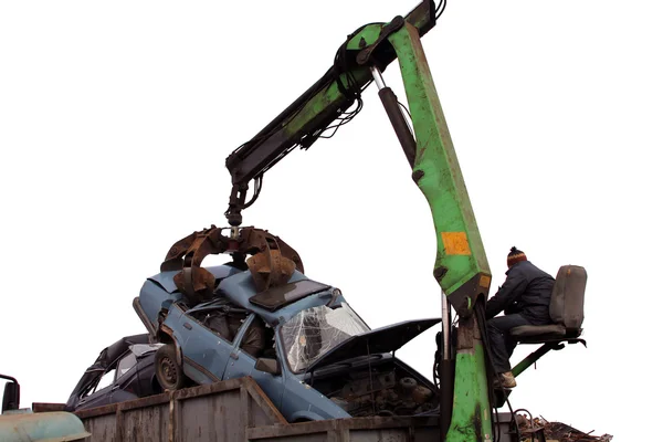 Maschinenlader recycelt altes Auto lizenzfreie Stockfotos