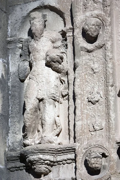 High-relief in badly damaged niche,relief of the Front of the chapel of El Salvador of Ubeda — Stock Photo, Image