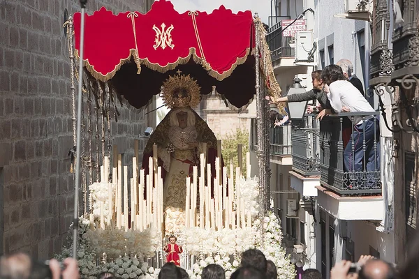 Women in a balcony by touching the embroidery of the throne of the virgin Mary during palm sunday — Stock Photo, Image