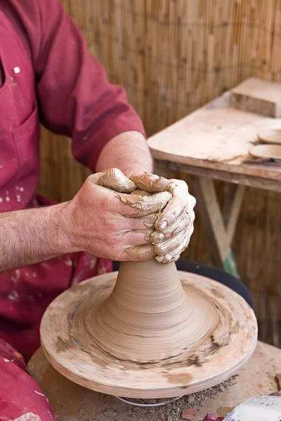 Potter hands on wheel at work, Spagna — Foto Stock